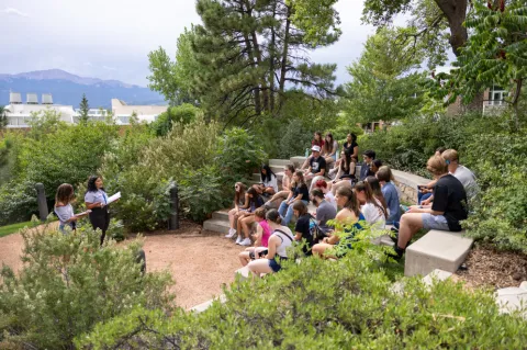 People sitting in an outdoor auditorium